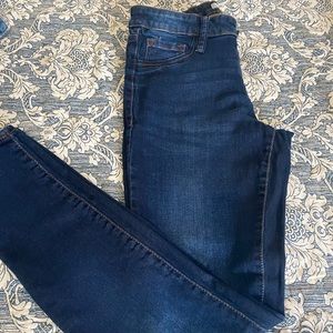 Refuge dark wash skinny stretch jeans.